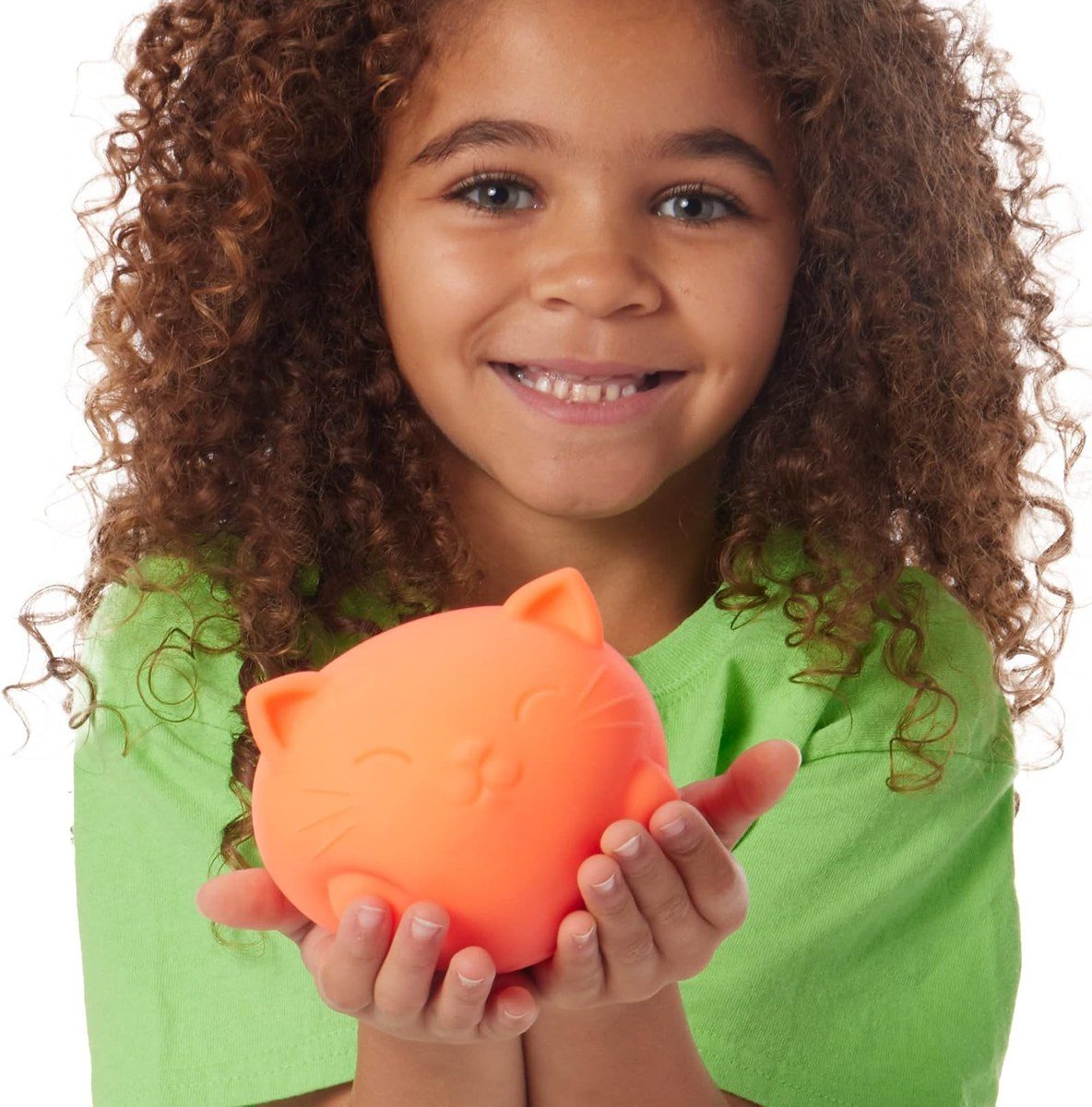 Girl hugging a Super Cool Cat NeeDoh